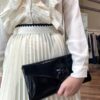 TWENTY FOURHAITCH Pochette in vernice con la rosa