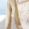 AGGÉL Pantalone spalmato glitter ampio con cintura