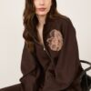 PHILIA LOFT Bomber in felpa con manica balloon e spilla fiore